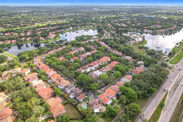 10764 Lenox Rd, Hollywood, FL 33026 - aerial view of property and surrounding area featuring nearby suburban area and a large body of water