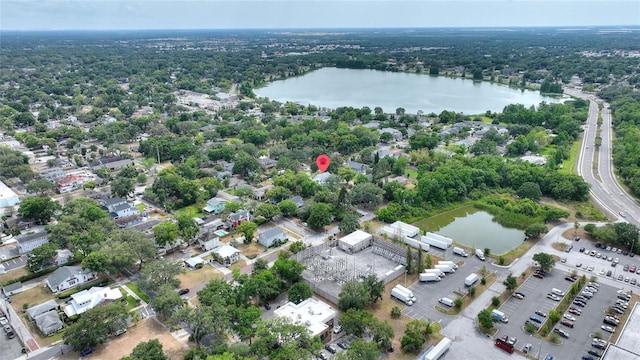 716 S Franklin Pl, Lakeland, FL 33815 - aerial overview of property's location featuring a nearby body of water and a forest