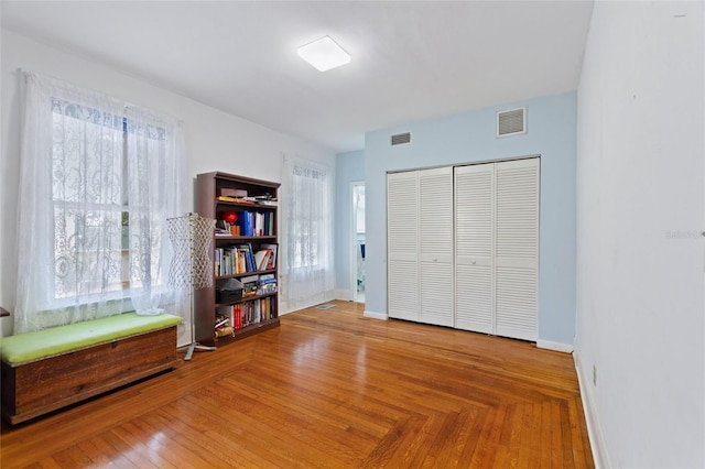 716 S Franklin Pl, Lakeland, FL 33815 - bedroom featuring baseboards and a closet