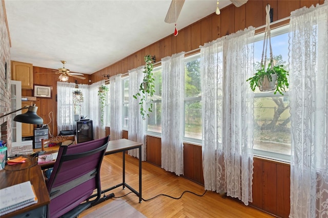 716 S Franklin Pl, Lakeland, FL 33815 - home office featuring ceiling fan, wooden walls, and plenty of natural light