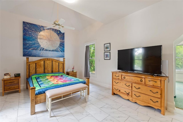 716 S Franklin Pl, Lakeland, FL 33815 - bedroom featuring light marble finish floors, high vaulted ceiling, a ceiling fan, and baseboards