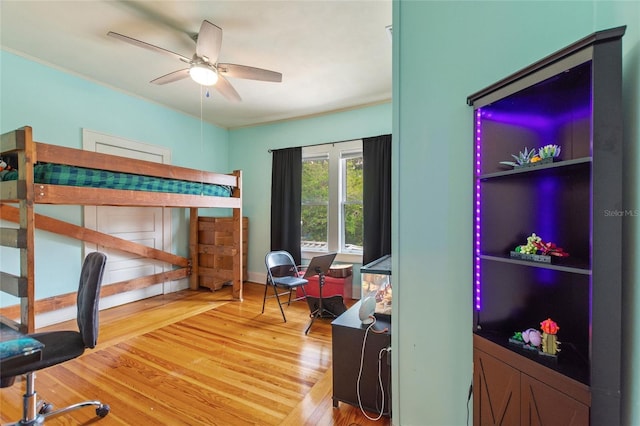 716 S Franklin Pl, Lakeland, FL 33815 - bedroom with wood finished floors and ceiling fan