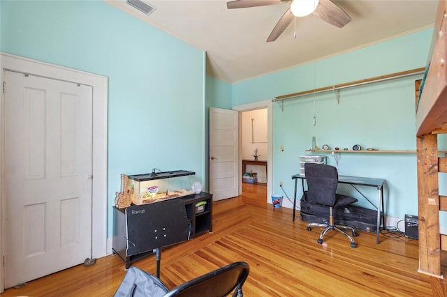 716 S Franklin Pl, Lakeland, FL 33815 - home office featuring a ceiling fan and wood finished floors