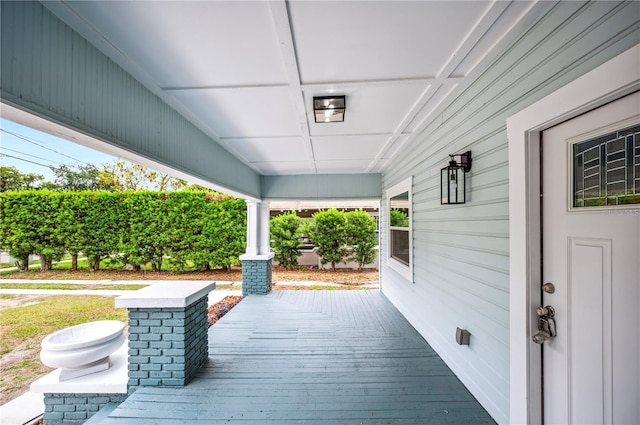 deck featuring covered porch
