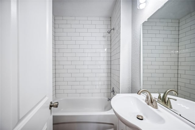 full bathroom with bathtub / shower combination and a sink