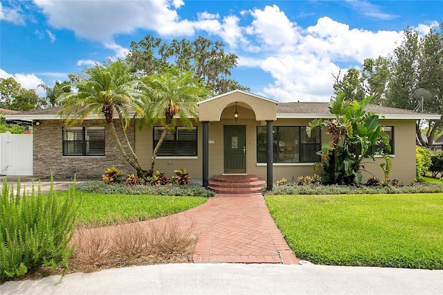 view of front of house with a front yard