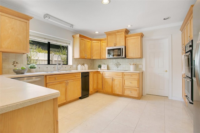 kitchen featuring a sink, stainless steel appliances, light countertops, ornamental molding, and light brown cabinetry