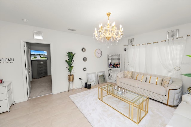 2039 Rosewood Cir, Lakeland, FL 33810 - living area featuring a chandelier, light tile patterned floors, and baseboards