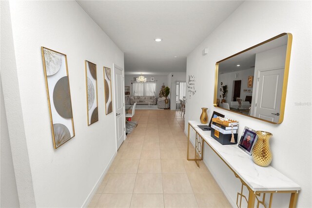 2039 Rosewood Cir, Lakeland, FL 33810 - hall featuring light tile patterned flooring, recessed lighting, and a chandelier