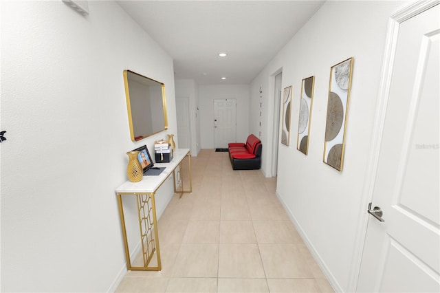 2039 Rosewood Cir, Lakeland, FL 33810 - hall with light tile patterned floors, recessed lighting, and baseboards