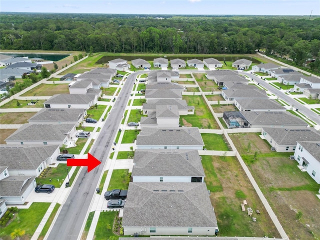 2039 Rosewood Cir, Lakeland, FL 33810 - aerial view of residential area with a heavily wooded area