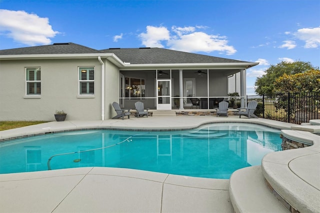 8909 N Campbell Rd, Lakeland, FL 33810 - view of swimming pool featuring a ceiling fan, a patio, and a sunroom