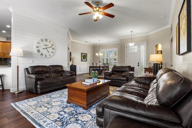 8909 N Campbell Rd, Lakeland, FL 33810 - living area featuring a ceiling fan, wood finished floors, ornamental molding, a chandelier, and recessed lighting