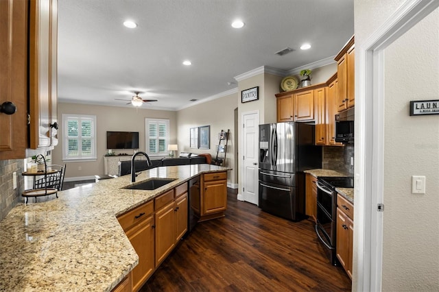 8909 N Campbell Rd, Lakeland, FL 33810 - kitchen featuring stove, refrigerator with ice dispenser, open floor plan, dishwashing machine, and dark wood-style flooring