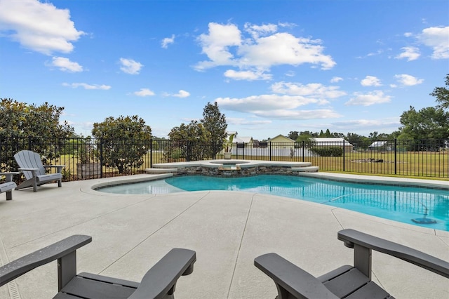 8909 N Campbell Rd, Lakeland, FL 33810 - view of swimming pool with a patio area and a pool with connected hot tub