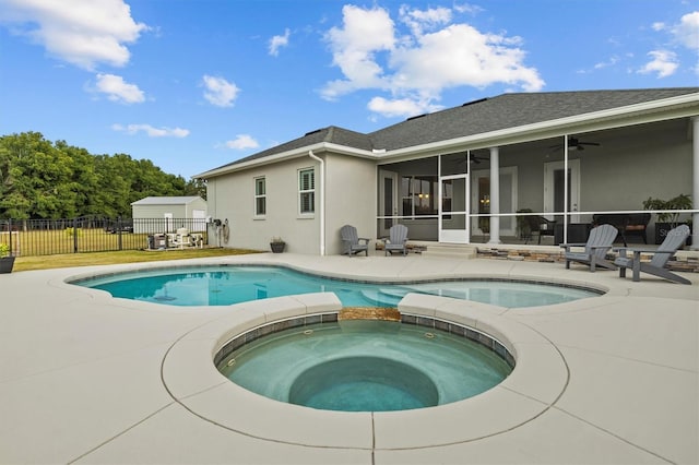 8909 N Campbell Rd, Lakeland, FL 33810 - view of pool with ceiling fan, a patio, a sunroom, and a pool with connected hot tub