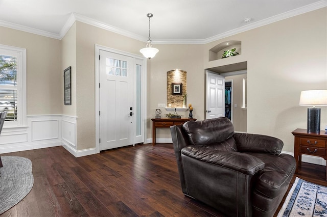 8909 N Campbell Rd, Lakeland, FL 33810 - entrance foyer with dark wood-style floors and crown molding