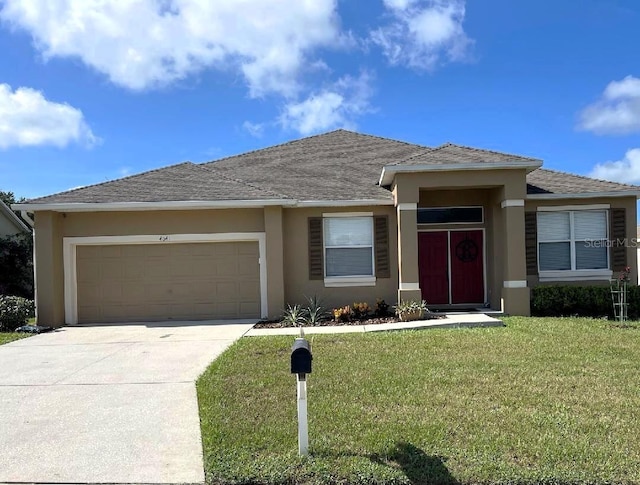 view of front of house featuring stucco siding, a front lawn, a garage, concrete driveway, and roof with shingles
