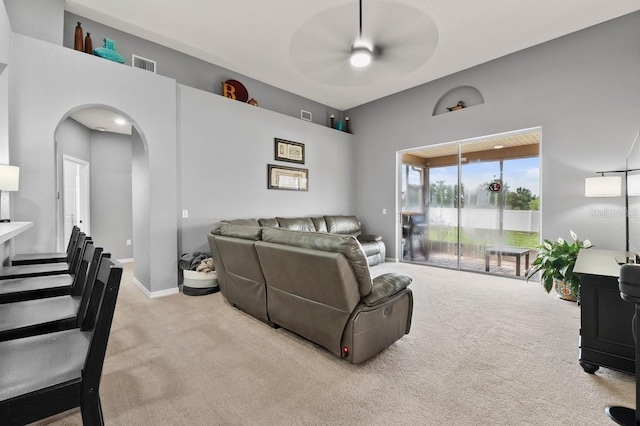 4041 Byrds Crossing Dr, Lakeland, FL 33812 - carpeted living room with ceiling fan and arched walkways