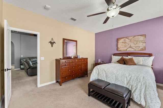 4041 Byrds Crossing Dr, Lakeland, FL 33812 - bedroom featuring light colored carpet, ceiling fan, baseboards, and a textured ceiling