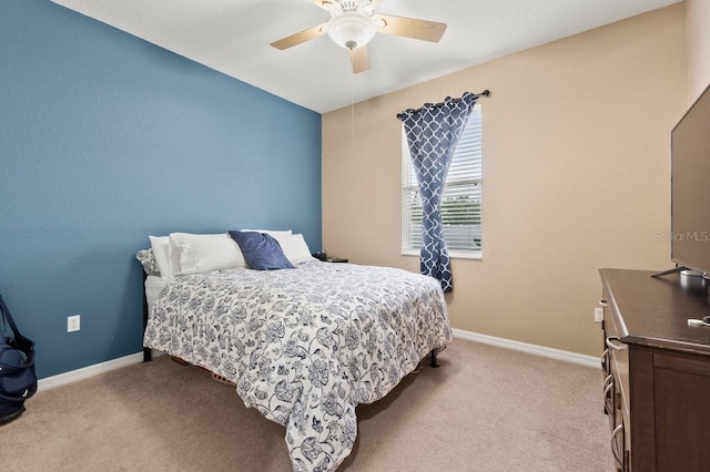 4041 Byrds Crossing Dr, Lakeland, FL 33812 - bedroom with carpet floors, a ceiling fan, and baseboards