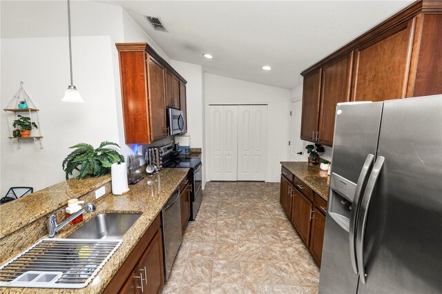 1825 Wallace Manor Ln, Winter Haven, FL 33880 - kitchen with appliances with stainless steel finishes, a sink, dark stone counters, recessed lighting, and hanging light fixtures