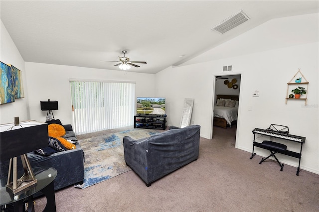 1825 Wallace Manor Ln, Winter Haven, FL 33880 - living area with vaulted ceiling, carpet floors, a ceiling fan, and baseboards