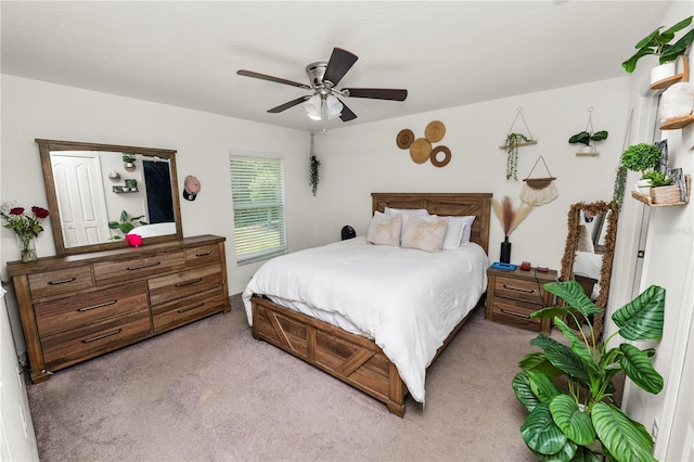 1825 Wallace Manor Ln, Winter Haven, FL 33880 - bedroom featuring light carpet and ceiling fan