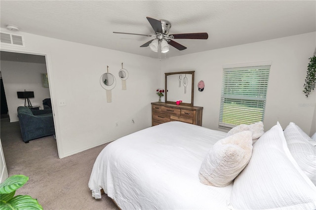 1825 Wallace Manor Ln, Winter Haven, FL 33880 - carpeted bedroom featuring a ceiling fan