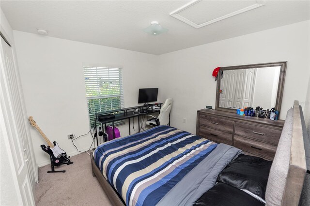 1825 Wallace Manor Ln, Winter Haven, FL 33880 - carpeted bedroom with attic access and baseboards