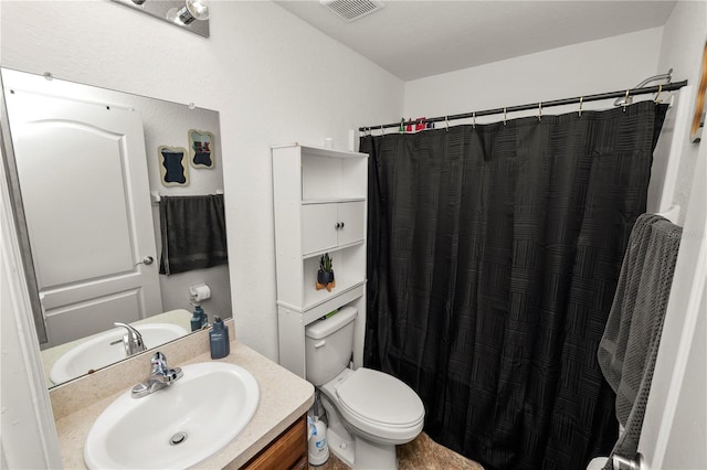 1825 Wallace Manor Ln, Winter Haven, FL 33880 - bathroom featuring toilet, vanity, and a shower with curtain