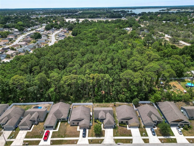 1825 Wallace Manor Ln, Winter Haven, FL 33880 - aerial view of property's location with nearby suburban area, a heavily wooded area, and a nearby body of water