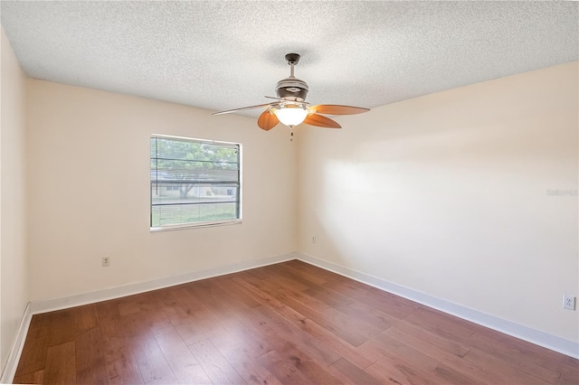 120 Bolender Rd, Auburndale, FL 33823 - unfurnished room with ceiling fan, wood finished floors, a textured ceiling, and baseboards