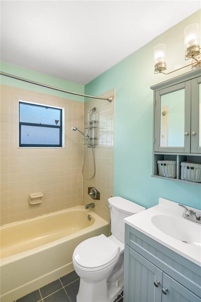 120 Bolender Rd, Auburndale, FL 33823 - full bathroom featuring tile patterned floors, bathing tub / shower combination, toilet, and vanity
