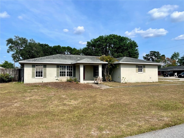 4038 Lehman Ln, Lakeland, FL 33813 - ranch-style home with stucco siding