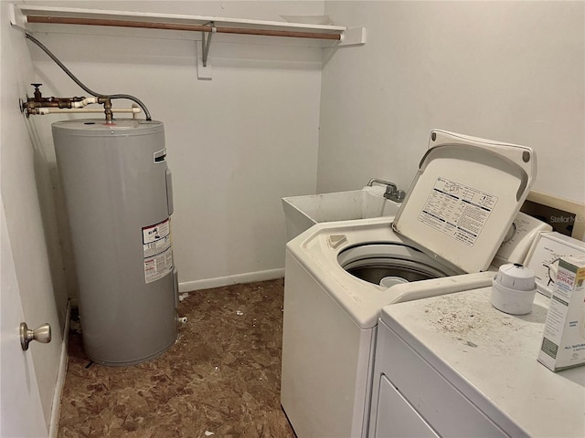 4038 Lehman Ln, Lakeland, FL 33813 - laundry room featuring water heater, separate washer and dryer, and baseboards