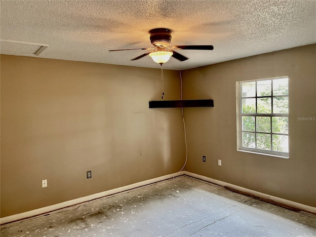 4038 Lehman Ln, Lakeland, FL 33813 - empty room with baseboards, ceiling fan, and a textured ceiling