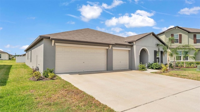 2991 Flying Blackbird Rd, Bartow, FL 33830 - view of front facade with an attached garage, stucco siding, concrete driveway, and a front yard