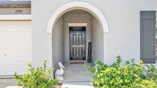 2991 Flying Blackbird Rd, Bartow, FL 33830 - property entrance featuring stucco siding