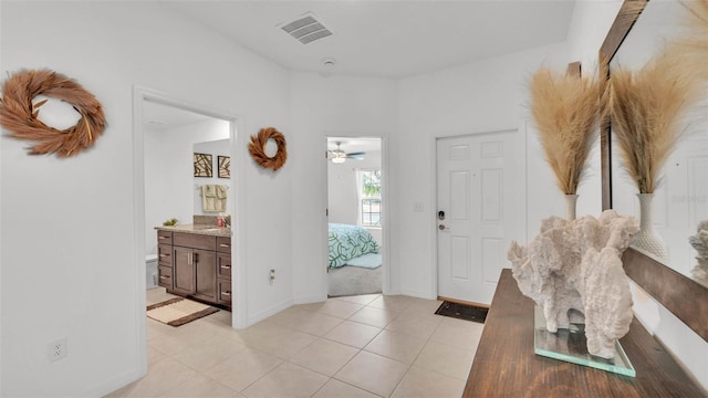 2991 Flying Blackbird Rd, Bartow, FL 33830 - foyer entrance with light tile patterned flooring and baseboards