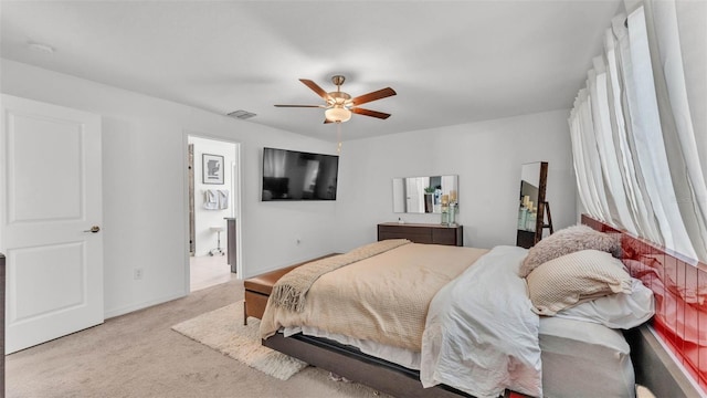 2991 Flying Blackbird Rd, Bartow, FL 33830 - carpeted bedroom with a ceiling fan and ensuite bath