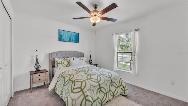 2991 Flying Blackbird Rd, Bartow, FL 33830 - bedroom with carpet flooring, baseboards, a closet, and a ceiling fan