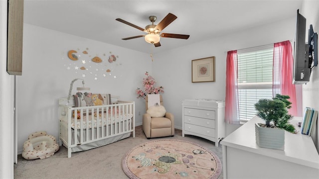 2991 Flying Blackbird Rd, Bartow, FL 33830 - carpeted bedroom with a nursery area and ceiling fan