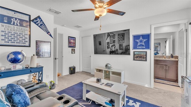 2991 Flying Blackbird Rd, Bartow, FL 33830 - carpeted living room with a ceiling fan and baseboards