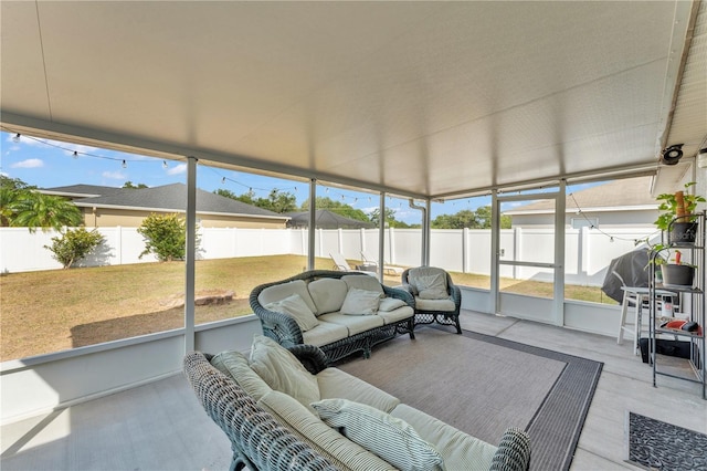 sunroom / solarium featuring an outdoor living space