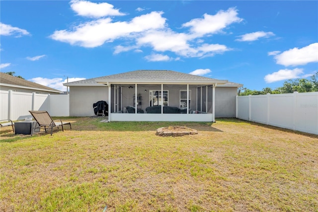 back of property featuring a sunroom