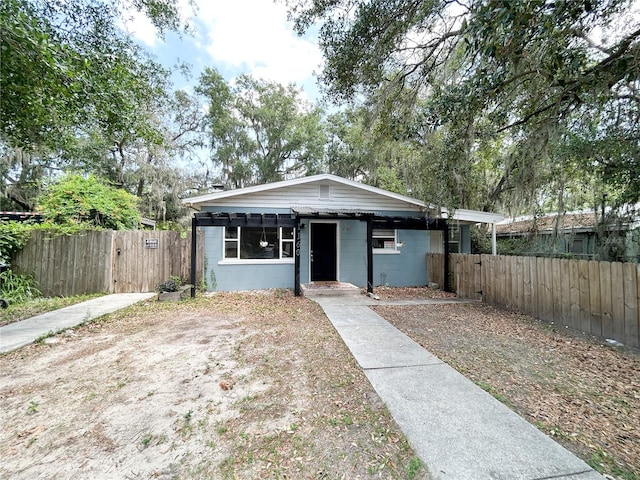 1160 Austin St, Bartow, FL 33830 - view of front of property featuring concrete block siding and fence