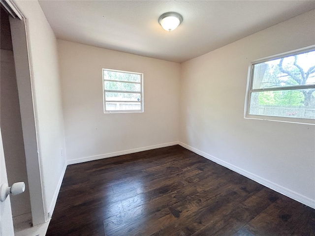 1160 Austin St, Bartow, FL 33830 - empty room with wood finished floors and baseboards