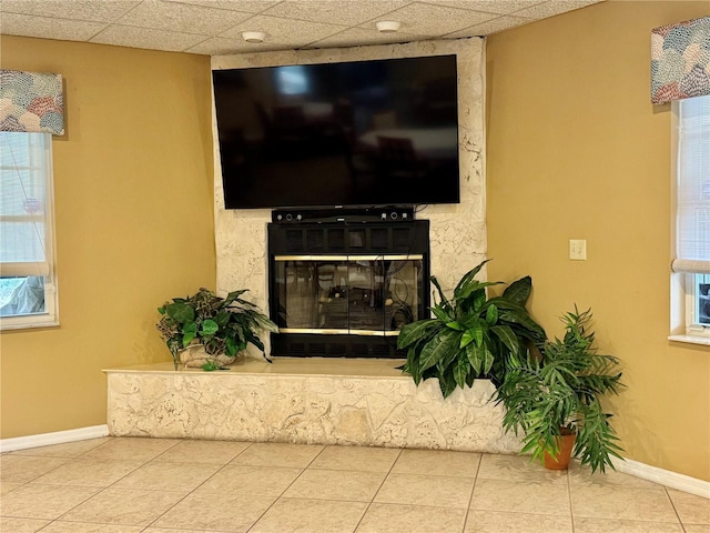 3798 N Chandler Dr, Hernando, FL 34442 - detailed view of a large fireplace, baseboards, and a drop ceiling