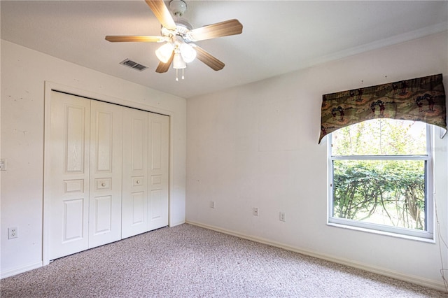 3798 N Chandler Dr, Hernando, FL 34442 - unfurnished bedroom featuring light colored carpet, a closet, baseboards, and ceiling fan